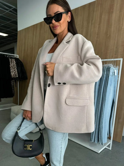 Oversized Single Breasted Blazer With Notched Lapel Chest Pocket And Flap Pockets Ideal For Office Wear Formal Events And Chic S